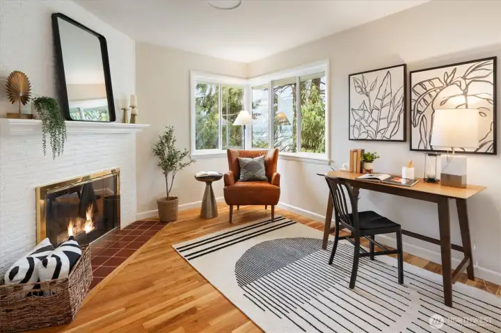 Main floor office with gas fireplace
