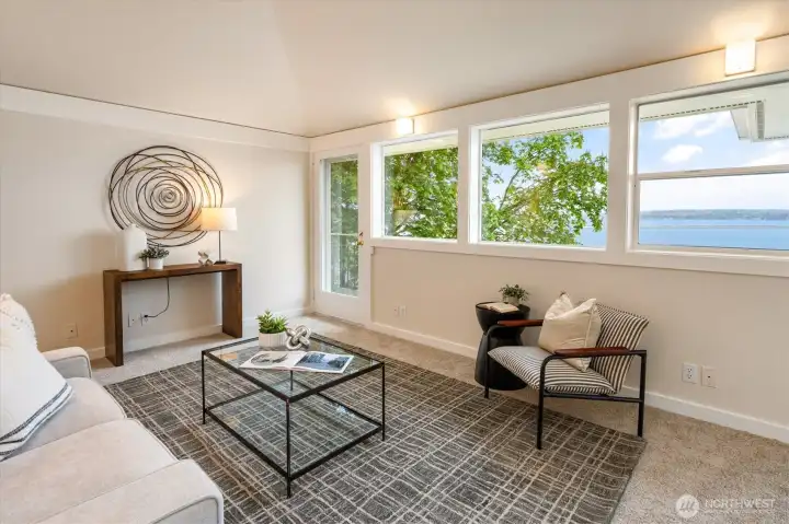 Den in upstairs primary bedroom suite