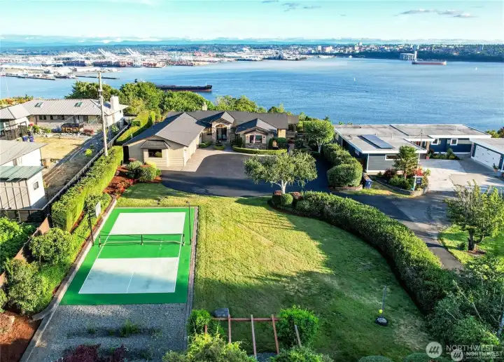 Welcome to this beautifully maintained 4,078 sq ft home nestled on a spacious .72-acre lot. This property offers breathtaking panoramic views of Mount Rainier, the Port of Tacoma, and the Puget Sound. With 4 bedrooms, 2.25 baths, and generous living spaces, this home is perfect for both relaxing and entertaining.