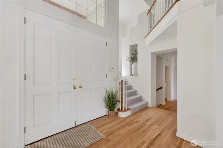 Grand entrance with fresh paint, refinished hardwoods and new carpet Grand entrance with fresh paint, refinished hardwoods and new carpet