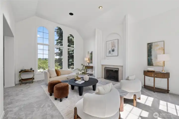 Formal living room with soaring ceilings and windows on two sides Formal living room with soaring ceilings and windows on two sides