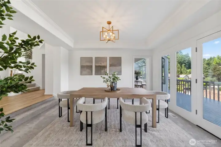 Spacious dining room with deck access Spacious dining room with deck access