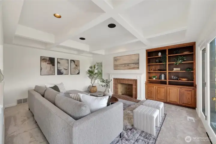 Family room with custom wood built-ins and fireplace Family room with custom wood built-ins and fireplace