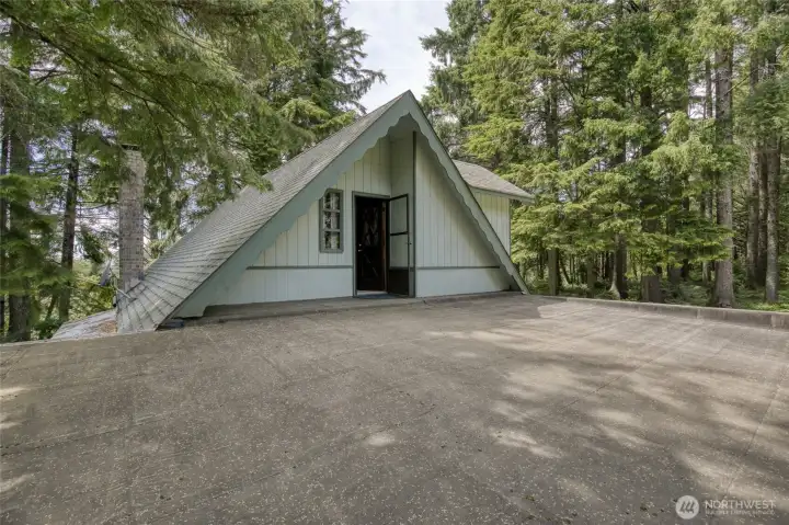 Roof Deck above the carport with door into Primary Bedroom.