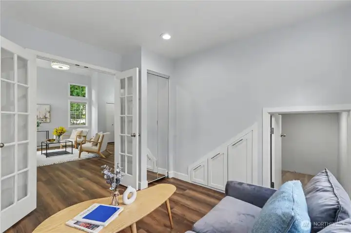 Main floor study with glass french doors!  This can be used as a 4th bedroom on the main floor! Don't miss the nice size closet with mini entrance.  Perfect for reading nook or a private space or study!