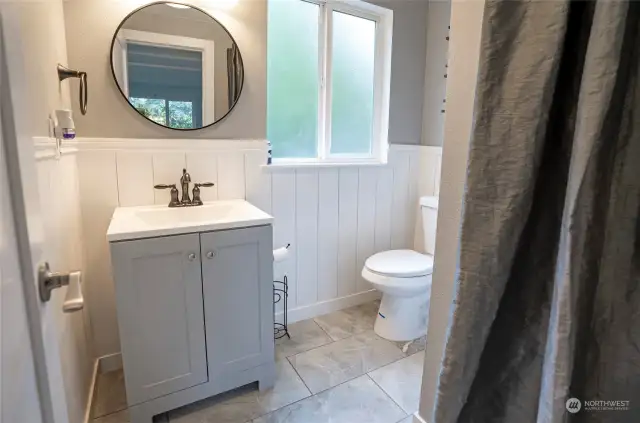 The lower level features a convenient 3/4 bath adjacent to the recreational room.