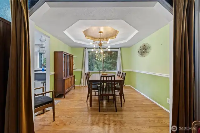 Formal dining room with awesome fixture.