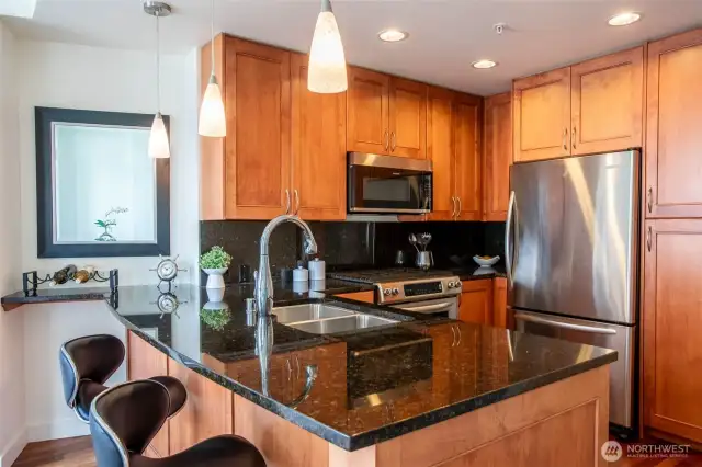 Spacious Countertop with room for Barstools.