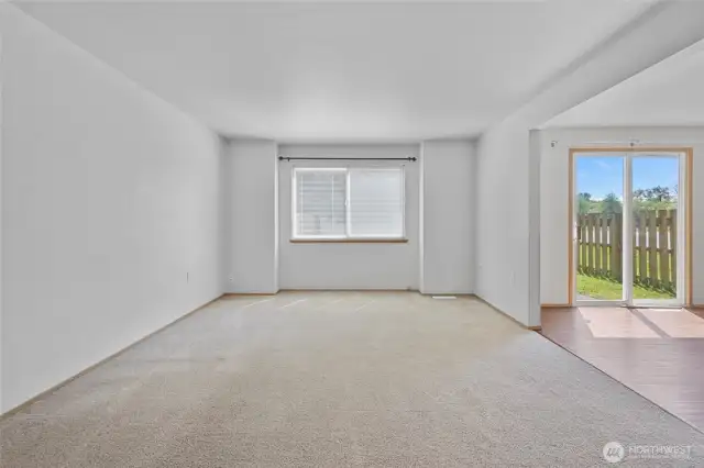 Living room facing back yard without virtual staging