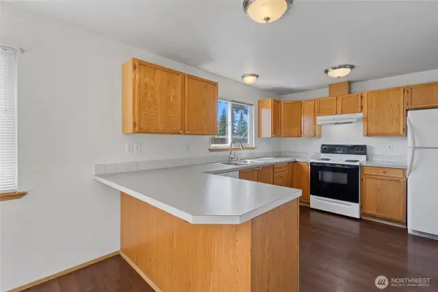 Spacious kitchen with eating bar
