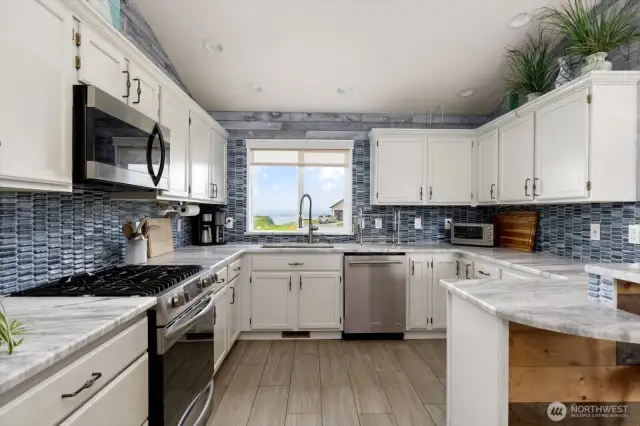 High quality cabinets and tile backsplashes.