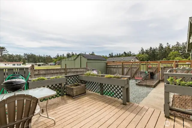 Back deck is inside fenced area.