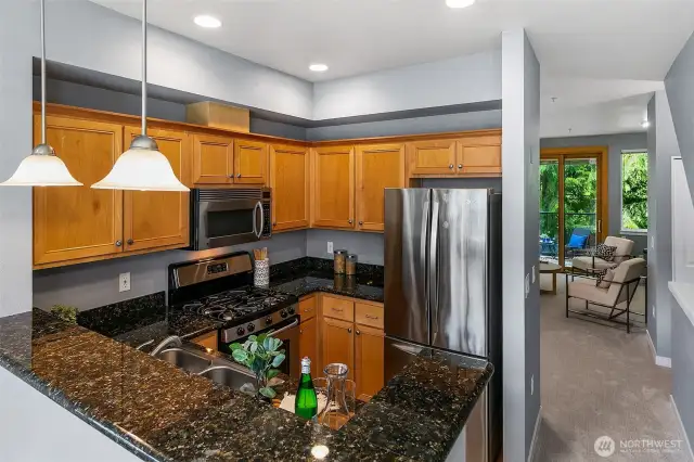 Kitchen has plenty of counterspace, gas cooking, and lots of storage.