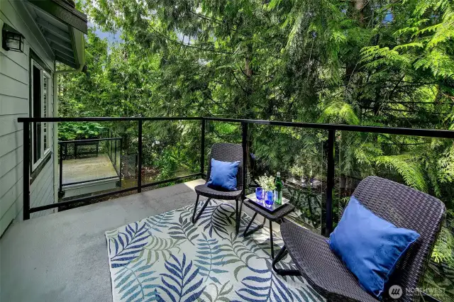 Spacious deck off living room from sliding doors; a great expansion of living space in the summer months.