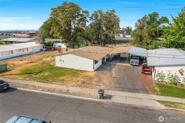 The driveway is shared by the two homes, but everything else is on it's own property.