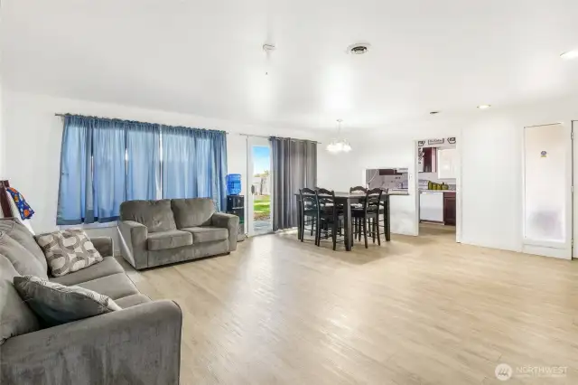 The living area is open, spacious, and clean!