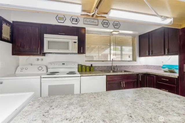 The owner has made several updates for heating, cooling, pantry storage, and under-cabinet lighting.