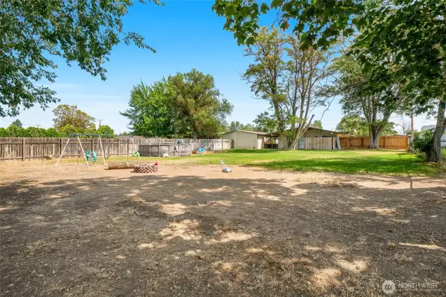 This view is from all the way back at the fence, facing toward the house. There's lots of room to run and play back here!