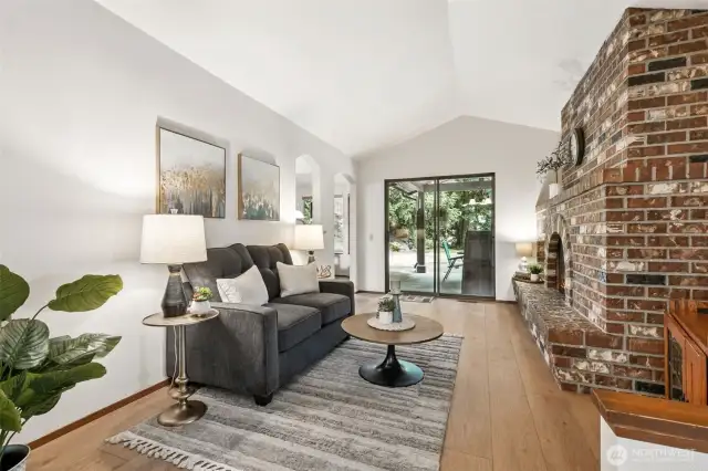 The cozy family room slides into the kitchen (to the left) and the slider out to the covered patio.