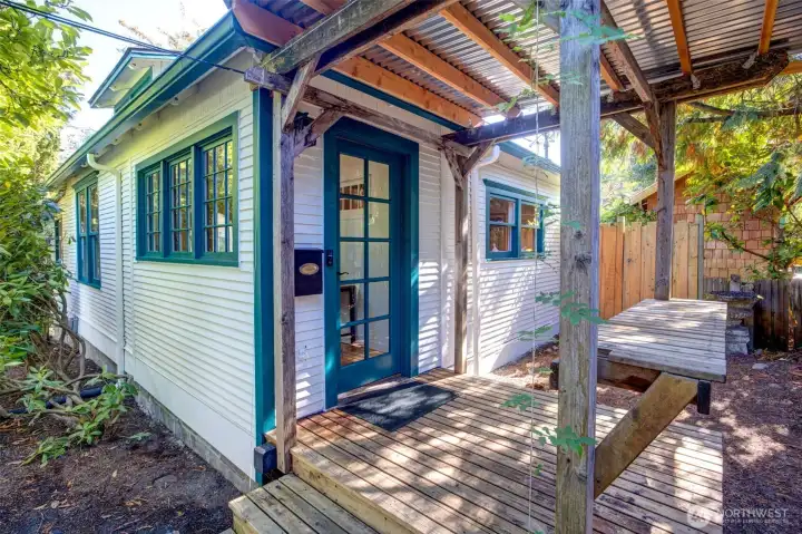Sweet cottage with covered front porch.