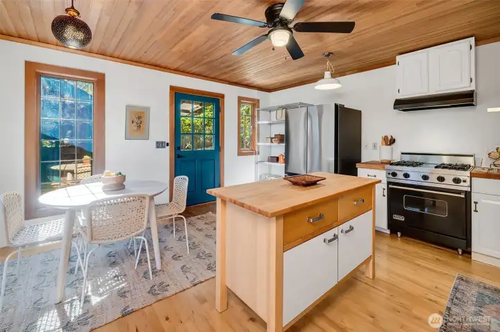 Light bright kitchen with dining space.