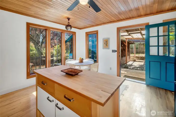 Kitchen overlooks the backyard.