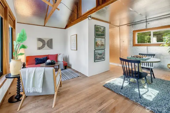 Partially drywalled and fully insulated. And another cool wood floor.