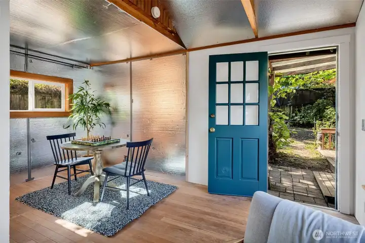 The studio looks out on the private back yard.