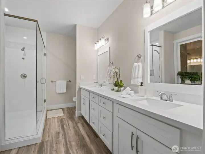 The large walkin shower and double sinks.