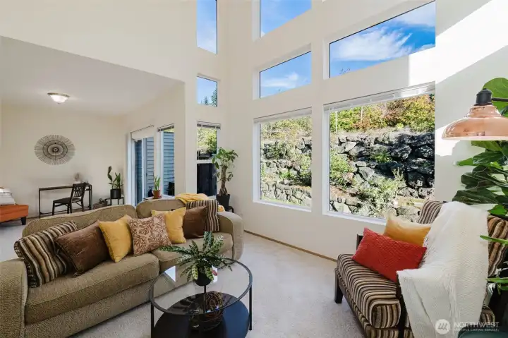 Living room is open to breakfast nook/flex space and kitchen.