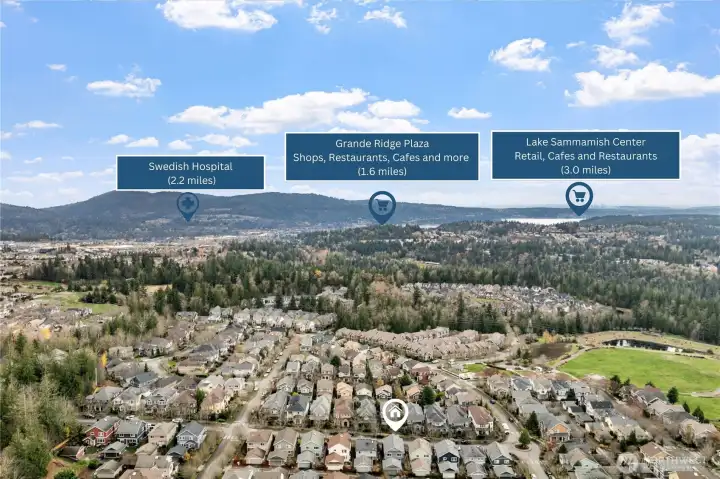 This stunning aerial view highlights the home’s ideal location, surrounded by natural beauty and close to everyday conveniences. Nearby amenities include Swedish Hospital (2.2 miles), Grand Ridge Plaza with shops, restaurants, and cafés (1.6 miles), and the Lake Sammamish Center for additional retail and dining options (3.0 miles)—all just moments from your doorstep.