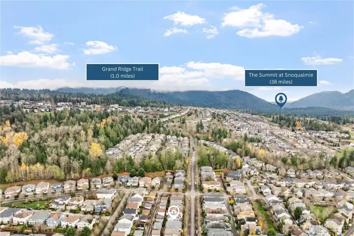 Enjoy proximity to the scenic Grand Ridge Trail, located just 1.0 mile from the home. This expansive trail system stretches for over 7 miles, offering lush forest surroundings perfect for hiking, mountain biking, and year-round outdoor adventure—all just moments from your doorstep.