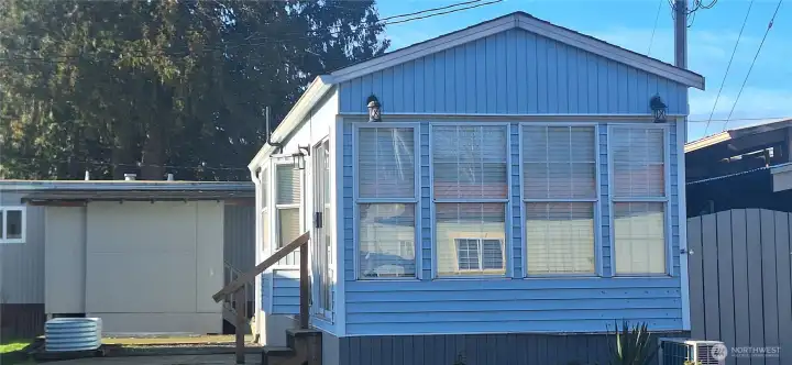 STREET SIDE ~ HOME FACES EAST