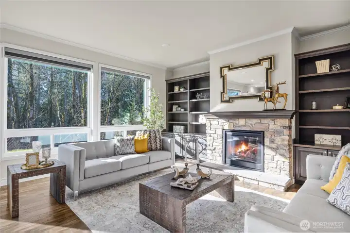 Living room with extra large windows.