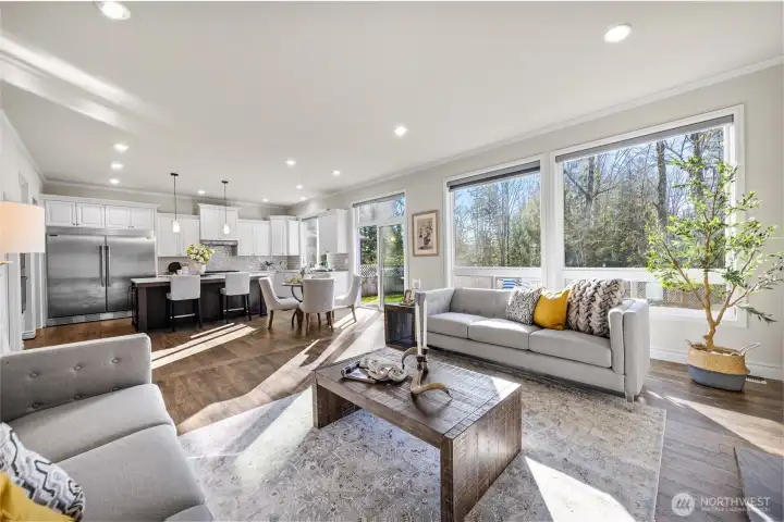 Open floor plan connects kitchen, nook and living area.