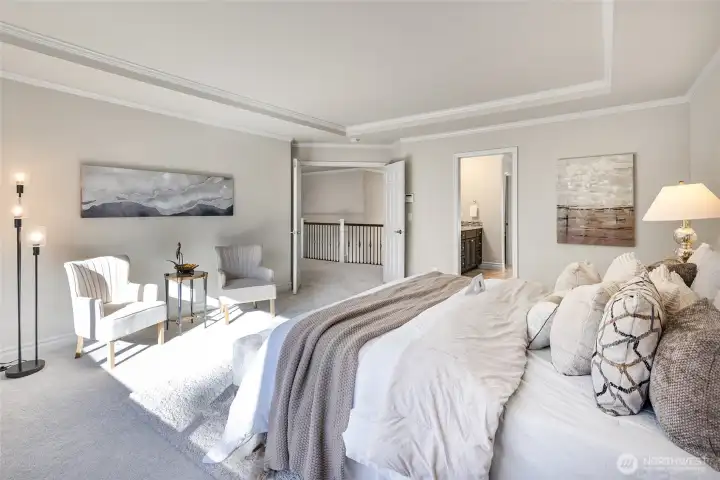 Primary bedroom with adjacent primary bath.