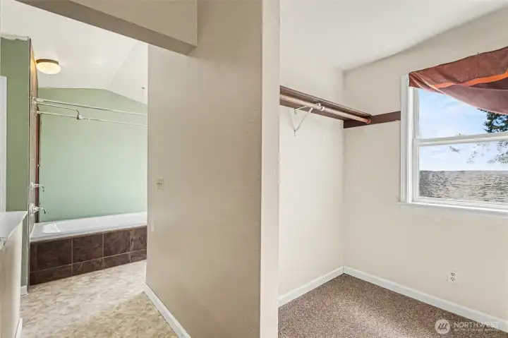 Walk in closet in primary bedroom on the 2nd floor.