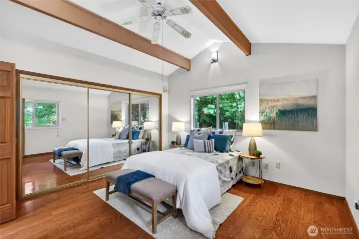 Your primary bedroom is airy and bright, with plenty of closet space.