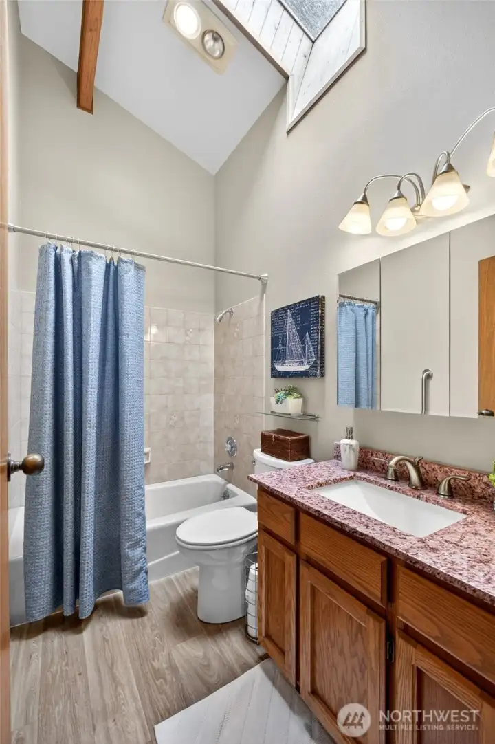 This full guest bath is on the main level.