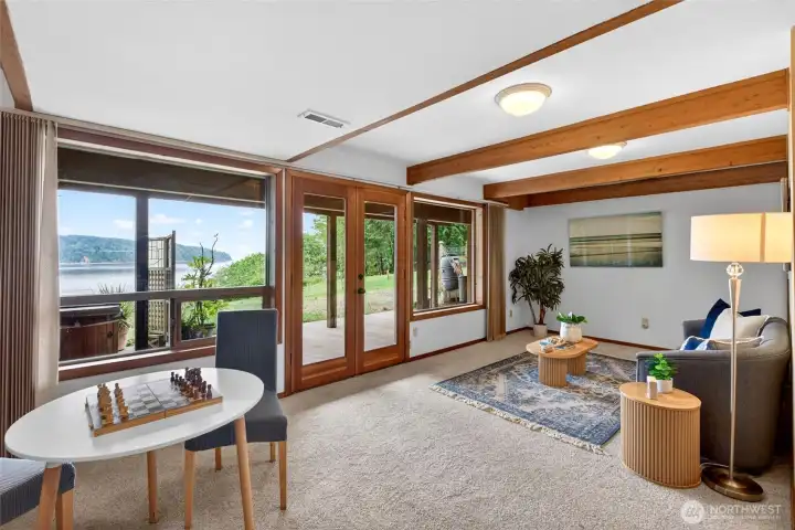 The view is spectacular on both levels of the house. Walk out those doors to your hot tub that stays.