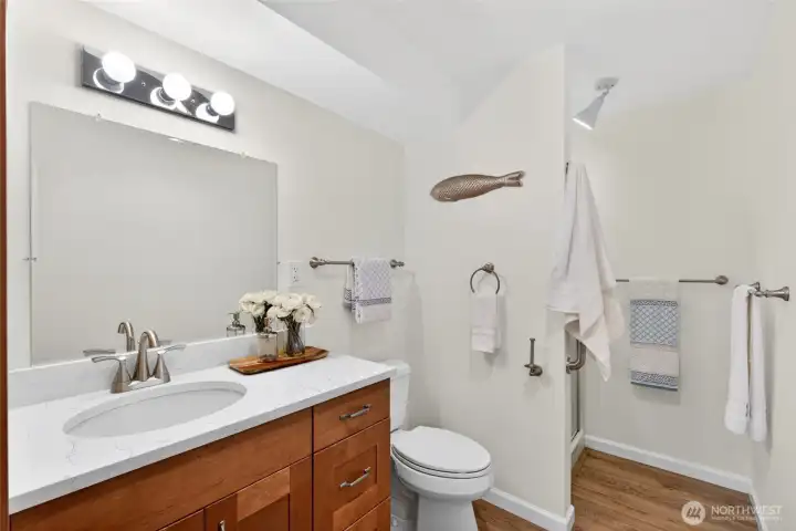 The downstairs bathroom has been recently remodeled.