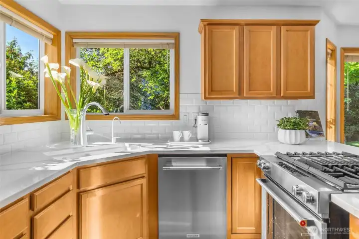 Updated in 2021, this kitchen has stylish features like Quartz counters, full height subway tile backsplash and new appliances. Updated in 2021, this kitchen has stylish features like Quartz counters, full height subway tile backsplash and new appliances.