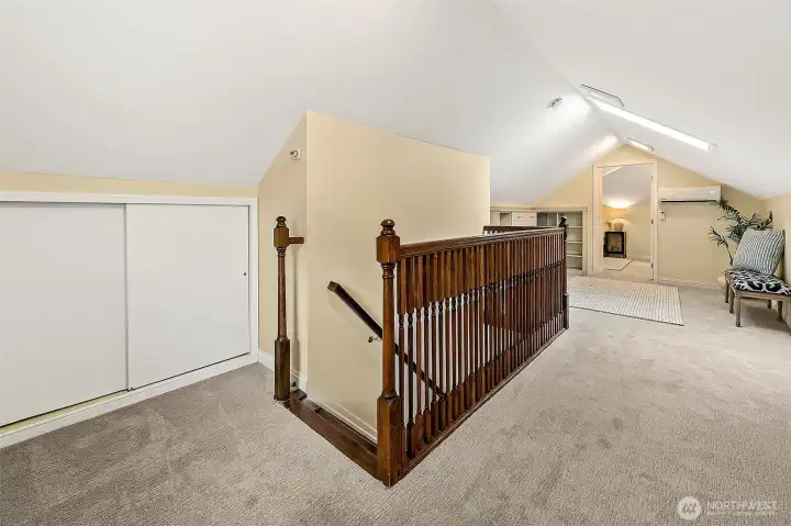 Upstairs, a large, flexible loft space