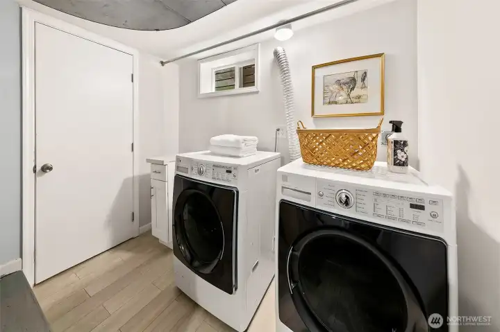 Downstairs, a dedicated laundry room.