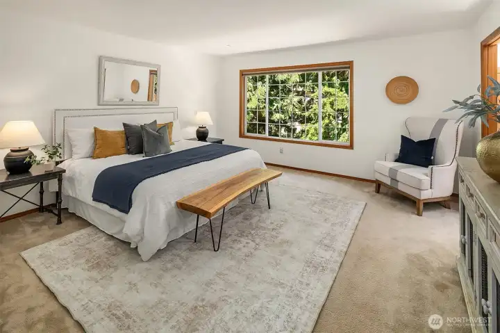 Upstairs you'll find this sizable primary suite. Upstairs you'll find this sizable primary suite.