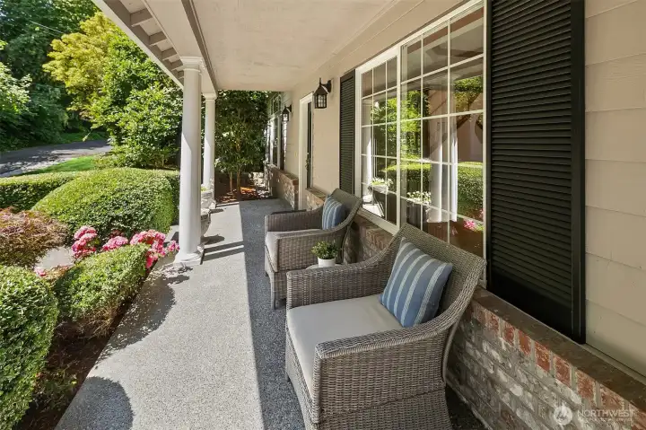 The shady front porch beckons you to take your morning coffee outside. The shady front porch beckons you to take your morning coffee outside.