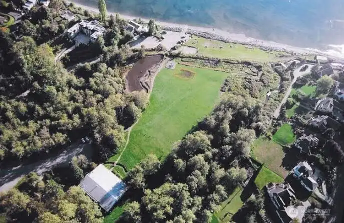 The property enjoys Lot A beach rights and Cove Community Club Access (with voluntary dues). The property enjoys Lot A beach rights and Cove Community Club Access (with voluntary dues).