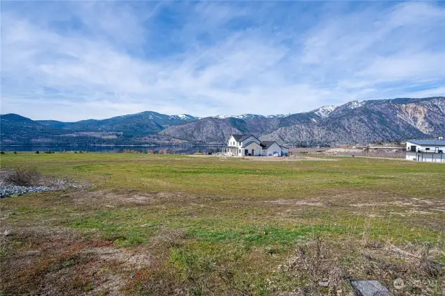 Lot 5 has mostly flat terrain with a gentle slope toward the back to optimize views