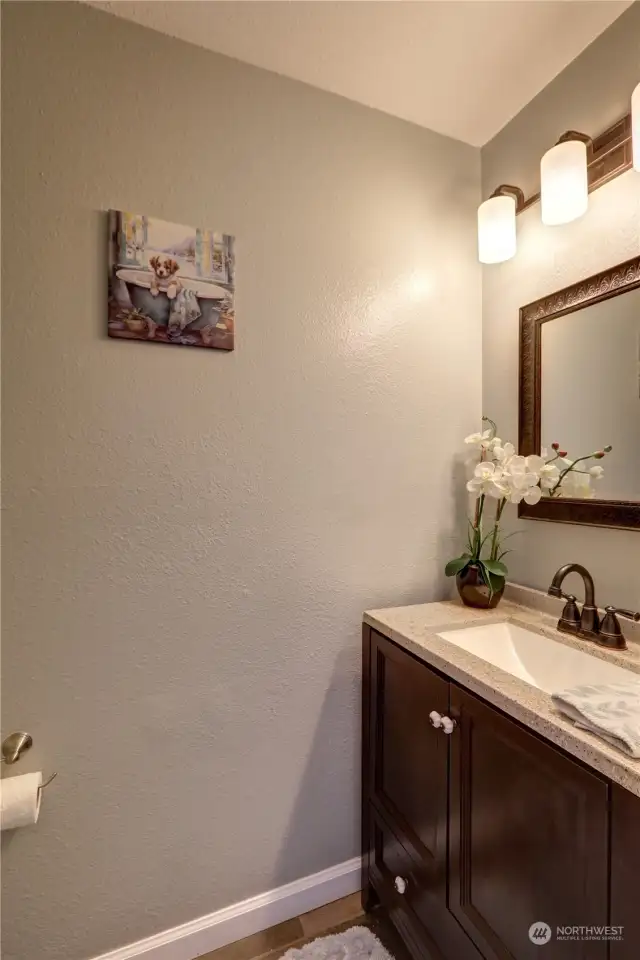Updated powder room on main level.