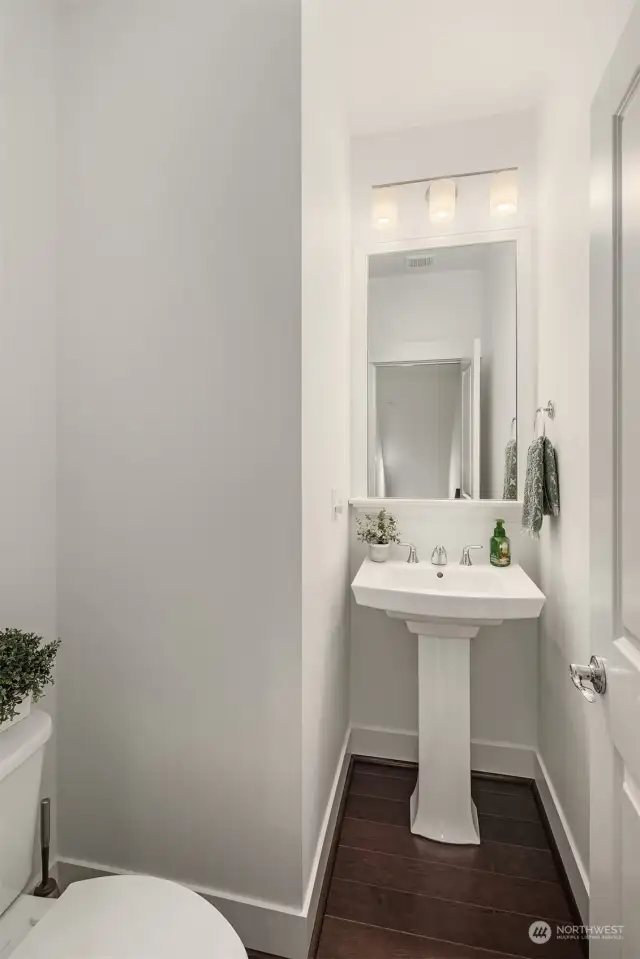 Guest powder room off of living space